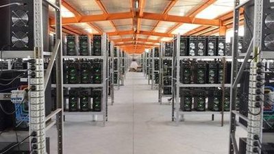 A vast mining farm filled with state-of-the-art mining equipment operating efficiently