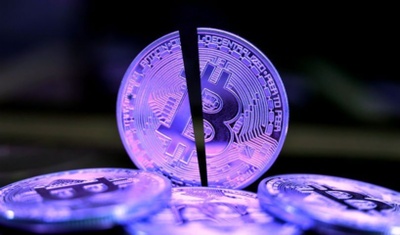 Bitcoin symbol glowing in a technologically advanced environment